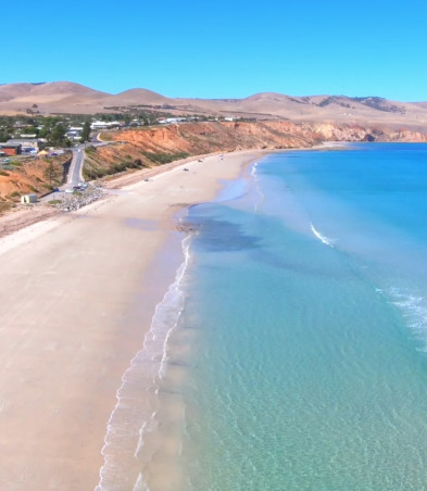 A beach as seen from a drone or helicopter.